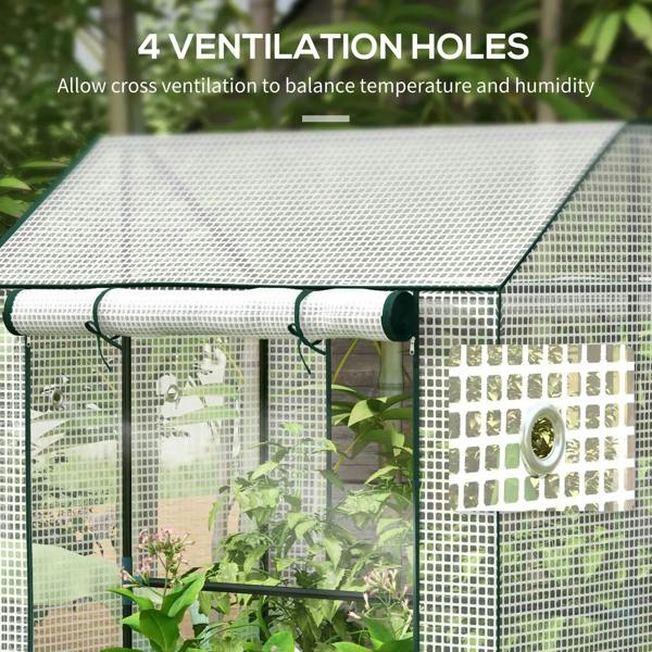 White greenhouse roof with ventilation holes and dark green roll-up door rail