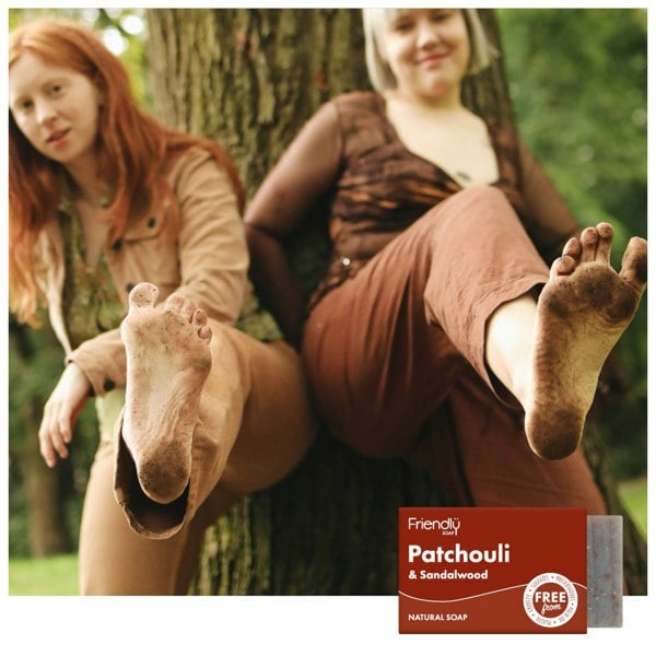 Two women in the woods with bare feet