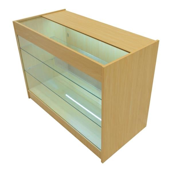 Vega LED shop counter set in maple finish, featuring a sleek design with glass shelves and a spacious display area for products