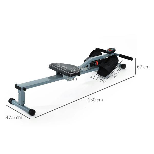 Compact grey rowing machine with black foot pedals, padded seat, and built-in handlebar monitor