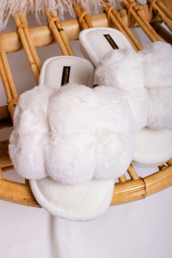 Dolly women's slider slippers in white with oversized faux fur pom poms from Pretty You London