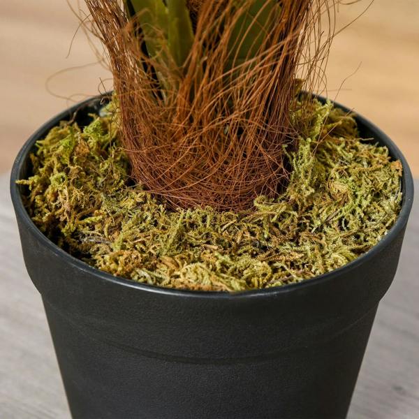 Close-up of faux rose tree in black pot with moss and brown trunk