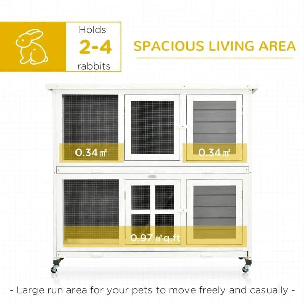 Two-tier rabbit hutch with multiple front doors, grey panels, and removable trays on wheels