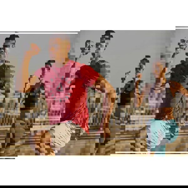 Man and woman exercising with Reebok 2kg Dumbbells