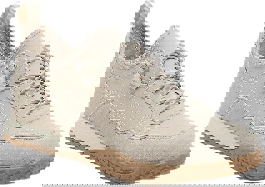 Rocket Dog Ruby Womens Casual Slip On Elastic Trainers, light beige sneaker with elastic laces and gum sole.