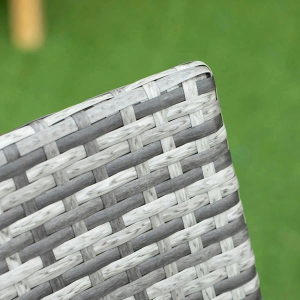 Close-up of grey woven rattan wicker edge on a dining chair