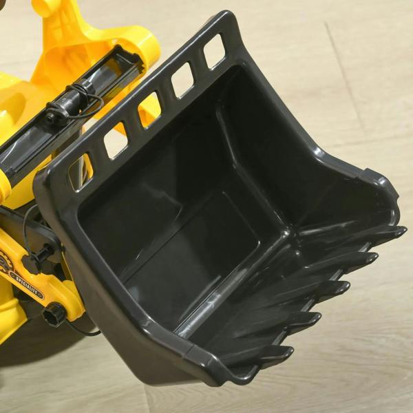 Close-up of yellow ride-on bulldozer’s black front bucket attachment