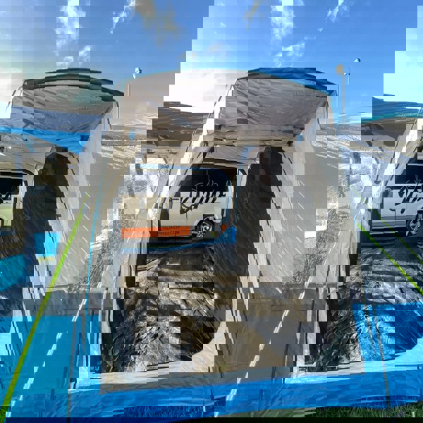 The view inside the OLPRO Cocoon V2 Poled Campervan Awning from the side door/peak canopy