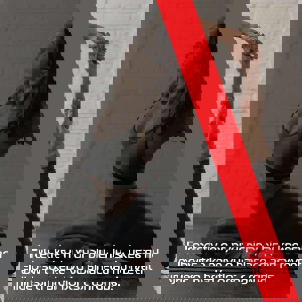 Purple yoga mat providing cushioning and support, ideal for balancing poses and preventing injuries on hard surfaces