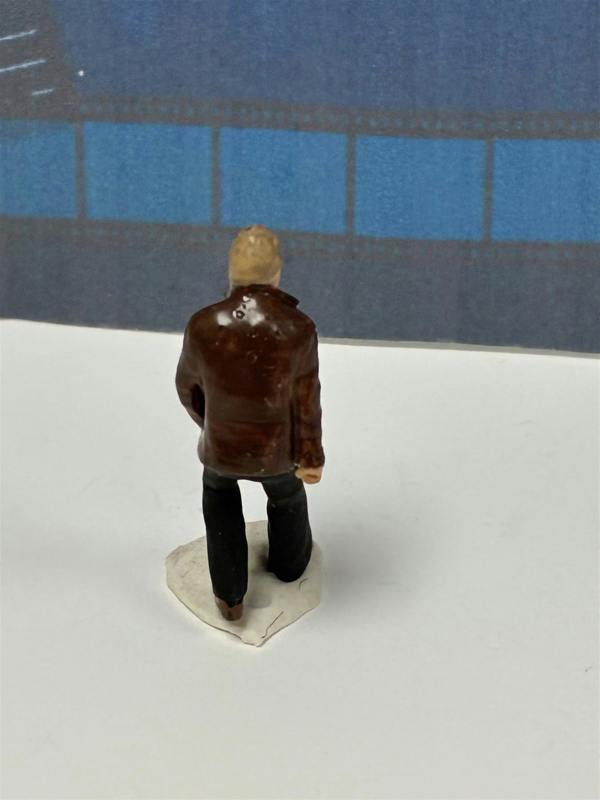 a small figurine of a man