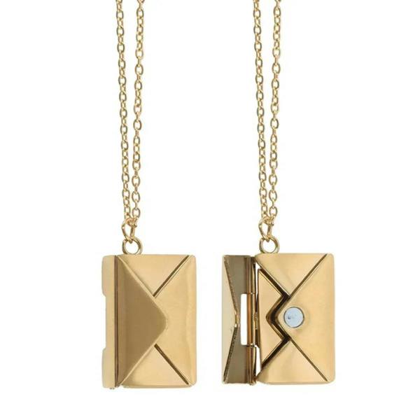 Gold-tone locket necklace pendants with hinged details, shown in two views