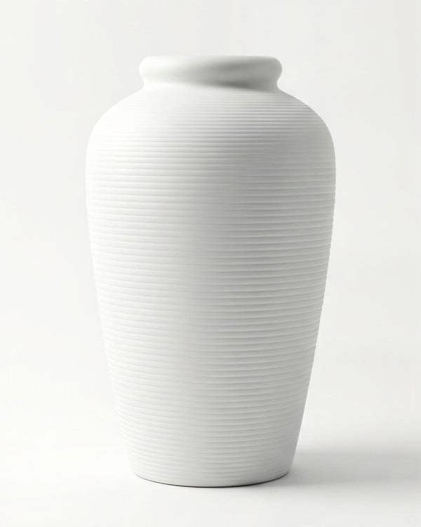 White ceramic vase on a white background