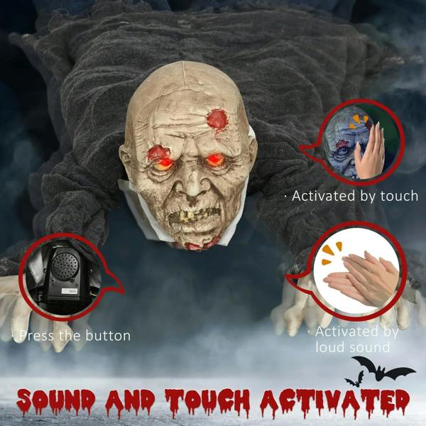Crawling zombie Halloween prop close-up of glowing red eyes and outstretched hands