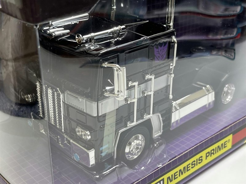 a toy truck in a plastic case