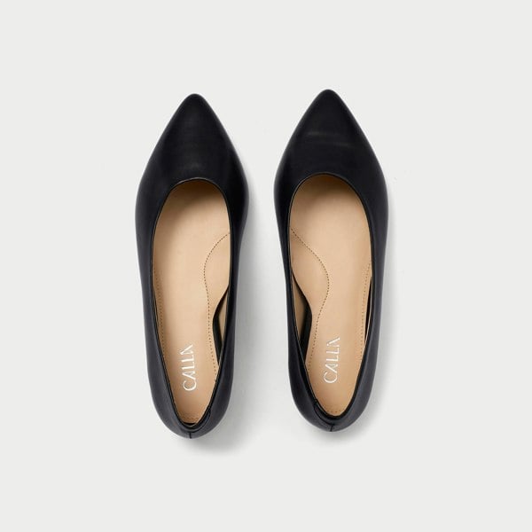 top view of a pair of black flats for bunions