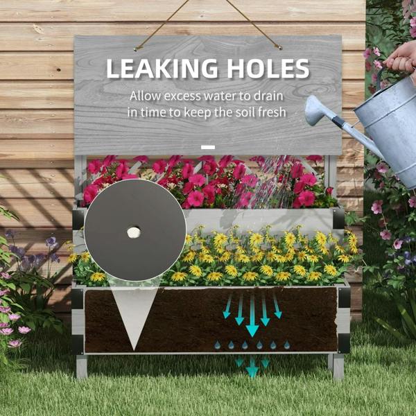 Grey 2-tier planter box with trellis, watering can aimed at drainage area
