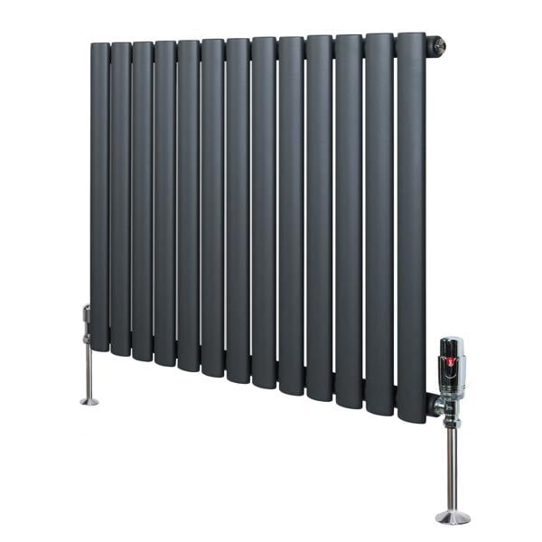 Oval single column radiator in anthracite grey, featuring sleek vertical tubes and stylish valves, ideal for modern interiors