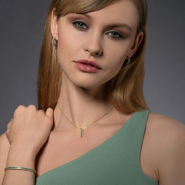 Gold Cuff Bangle Bracelet with Green Cubic Zirconia Stones - namana.london
