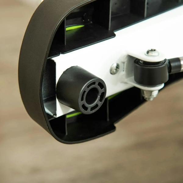 Stepper wheel and axle mechanism with black housing and green interior parts