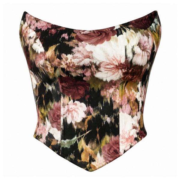 The Ivy Corset Top by Sarvin is a strapless jersey corset with a multicolored floral print in pink, burgundy, cream, and green on black. Its structured bodice and pointed waistline create a fitted hourglass silhouette.