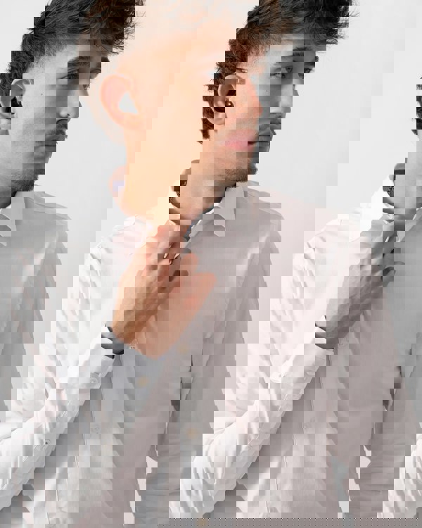 Close up of a Model wearing a Ted Baker Baxters Mens Long Sleeve Slim Stretch Shirt in White