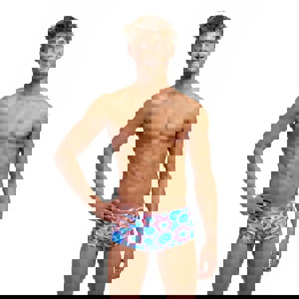 Funky Trunks Boys Bundjalung Blue Sidewinder swim trunks in blue and pink geometric pattern with wide elastic leg