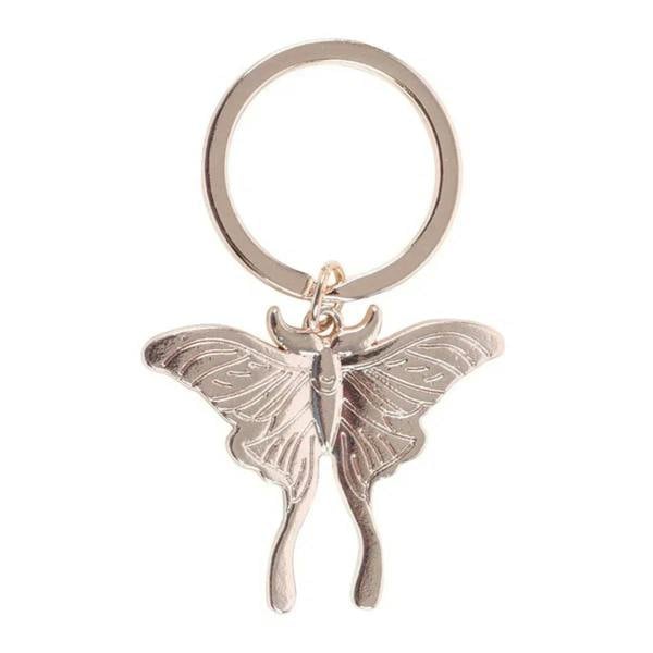 Round metal keyring with detailed silver winged moth charm and small gold clasp
