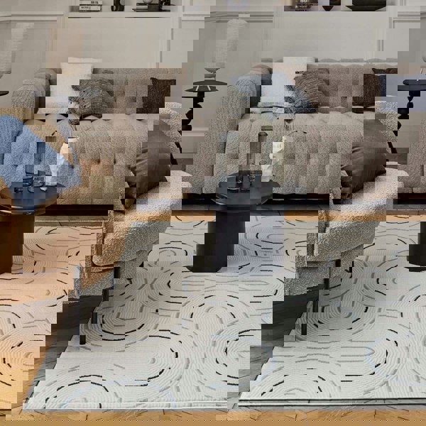 Living Room rug, blue-cream colours, geometric, practicality in mind, the rug is anti-allergic.