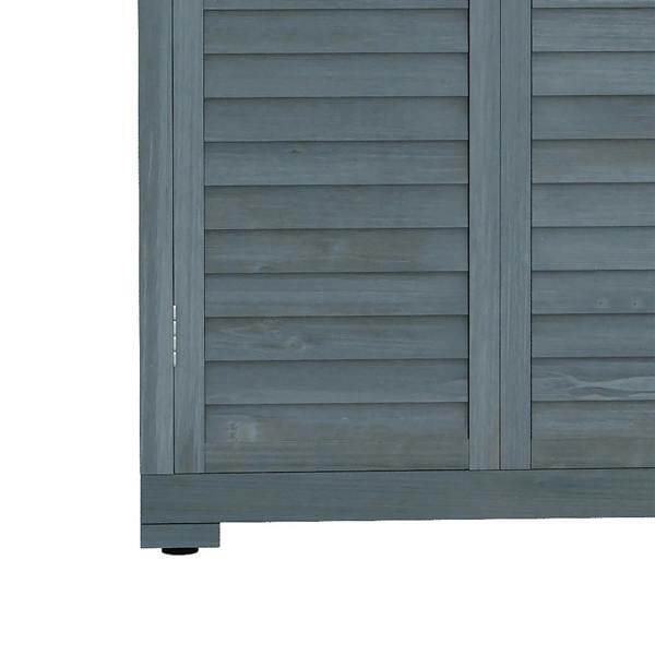 Grey shed door panel close-up with horizontal slats and small latch hardware.