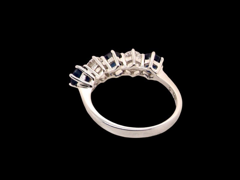 Vintage Tom An impressive five stone Sapphire and Diamond ring