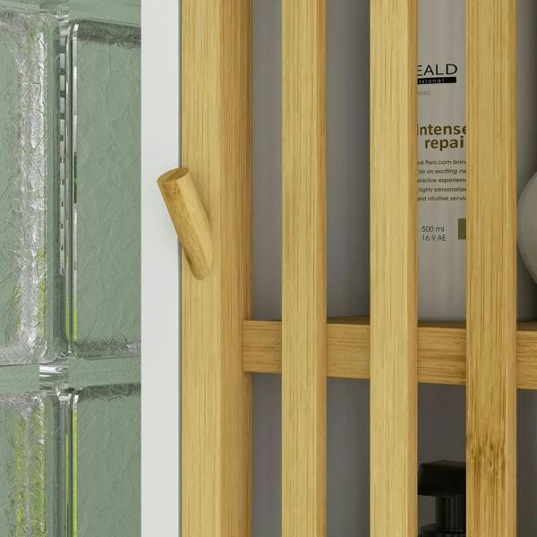 Close-up of natural bamboo slatted cupboard door with wooden handle