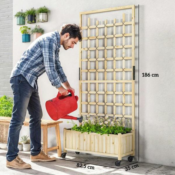 Raised wooden planter cart with trellis on caster wheels, filled with seedlings.