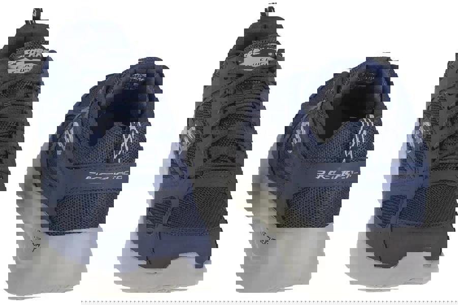 Skechers Dynamight 2.0 Fallford Mens Lace Up Memory Foam Casual Trainers, navy blue athletic men's sneakers with mesh and synthetic upper, cushioned collar, and lightweight white sole.