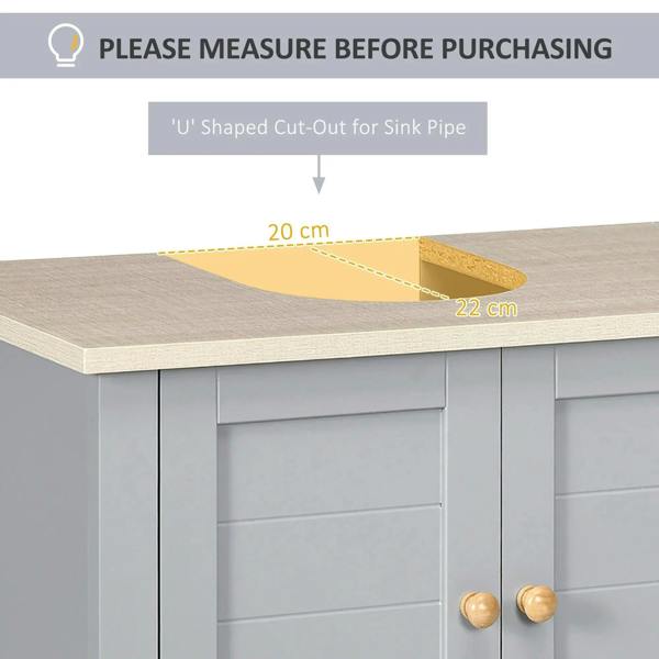 Grey cabinet top with U-shaped cut-out for sink pipe, light wood-look surface