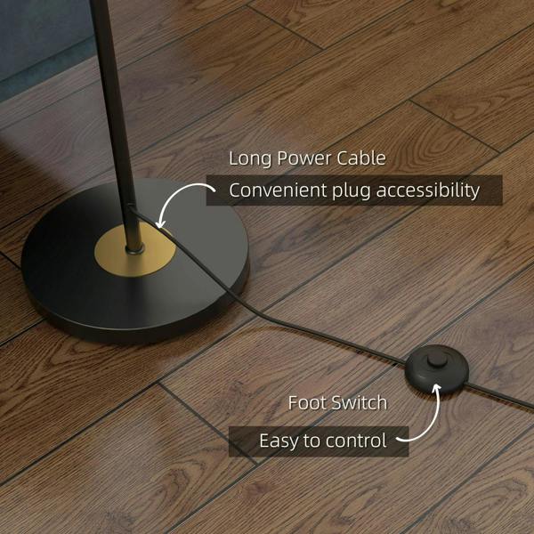 Grey floor lamp base with long power cable and foot switch on wooden floor