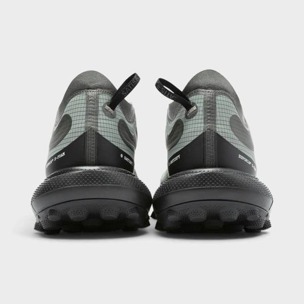 Supplied Fashion U The Rocker sneakers in shadow grey featuring a grid-patterned heel and textured black foam soles.