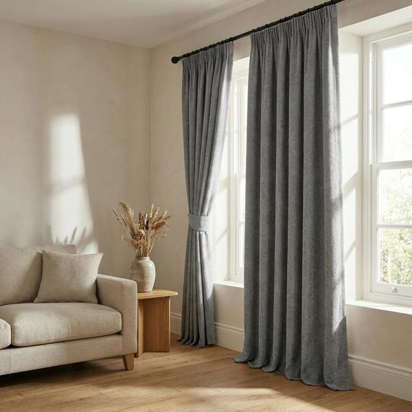 Tuvalu made-to-measure curtains in Zinc, styled in a living room