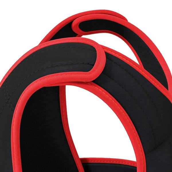 Black weighted vest with red trim, close-up of padded shoulder and strap curves