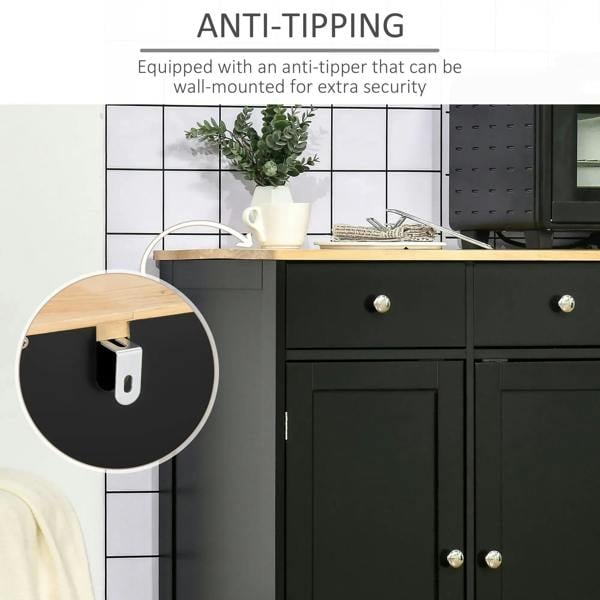 Black sideboard with anti-tip wall bracket at the cabinet corner and door hardware