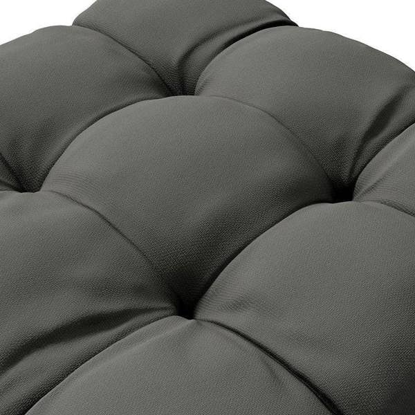 Charcoal gray quilted seat cushion close-up, tufted padded panels with stitching
