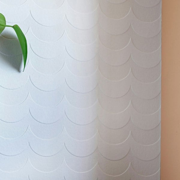 Detail of Scoop white flock wallpaper with a velvet finish