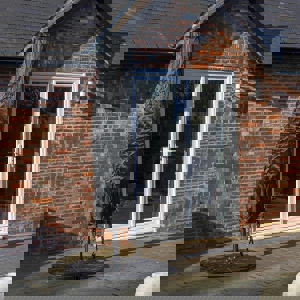 Samuel Alexander Outdoor 4 Person Round Glass Top Garden Dining Table Chairs With Green Banana Parasol and Base Set