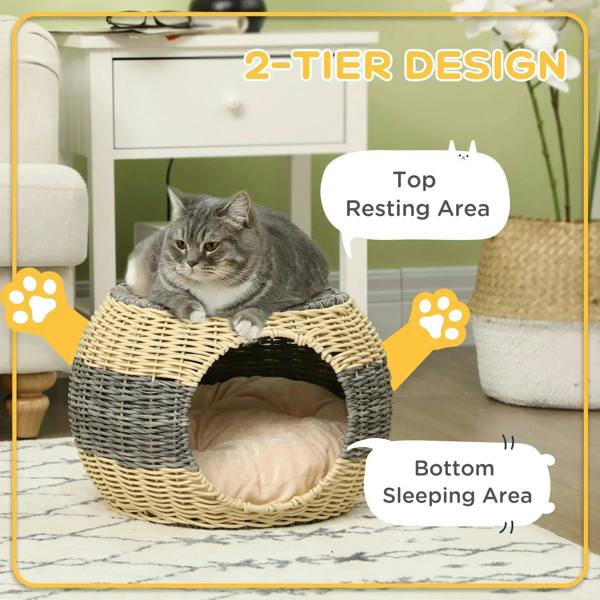 Wicker cat bed with round entrance, two-tone weave, and cushioned sleeping area.