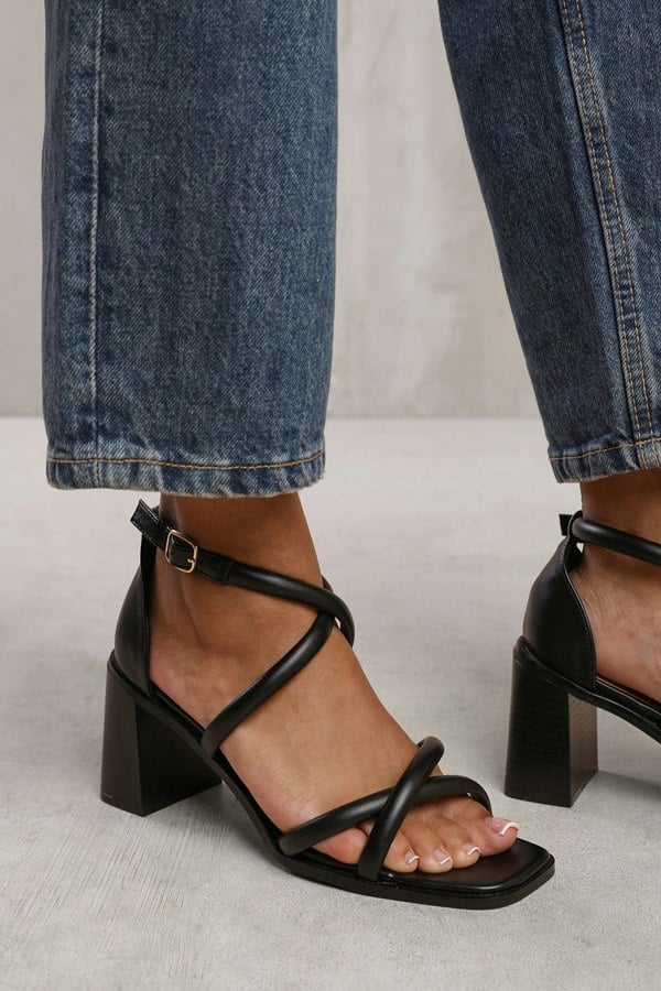 Where's That From Tori Cross Over Multi Strap Heels in Black Faux Leather