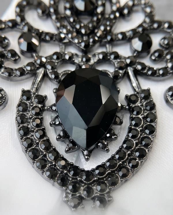 Pamoni Ornate Black Gem & White Ribbon Bow Tie Brooch