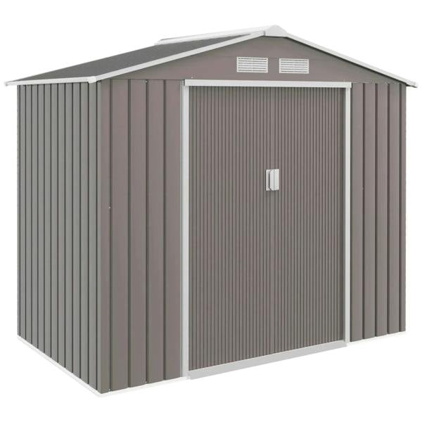 Grey metal storage shed with gable roof, vent panels, and single front door