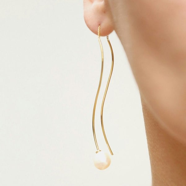 Gold vermeil wavy threaders with freshwater baroque pearls.