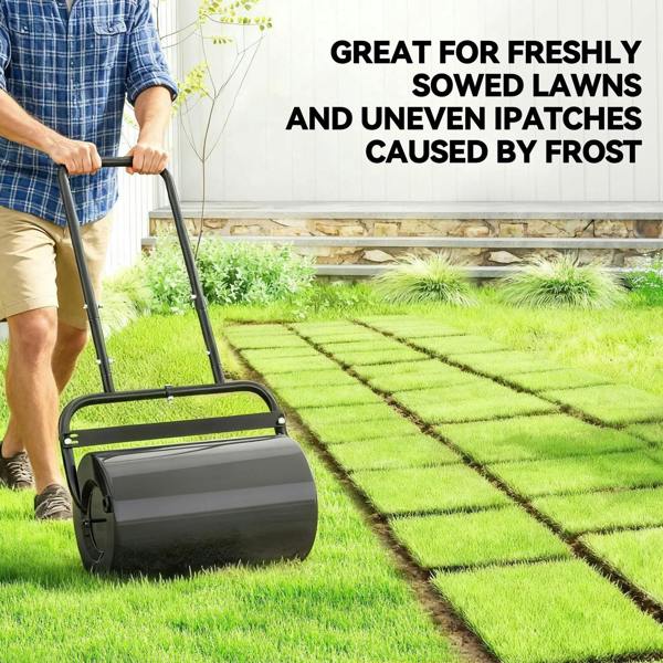 Black lawn roller with wide cylinder and foldable handle frame for even coverage