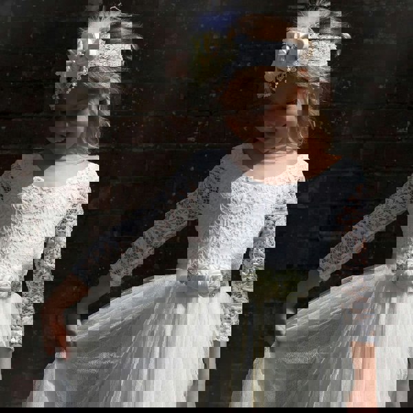 Young child happy wearing her dress