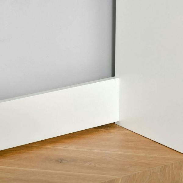 White desk corner with smooth paneling and sturdy base